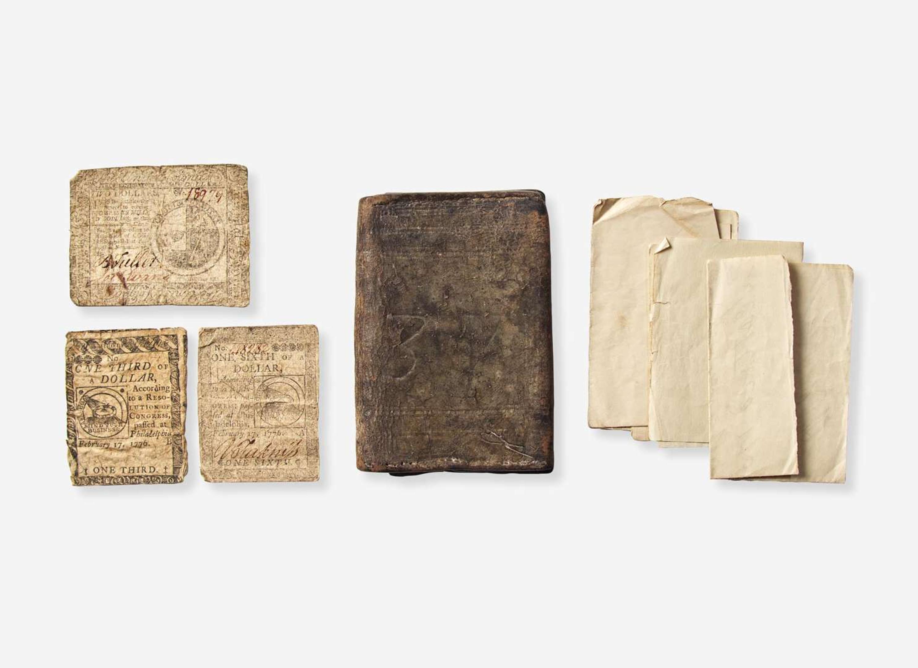 A tooled, dated and initialed leather pocketbook, belonging to Robert Morris, Sr. (1711-1750) and Robert Morris, Jr. (1734-1806), dated "1737"