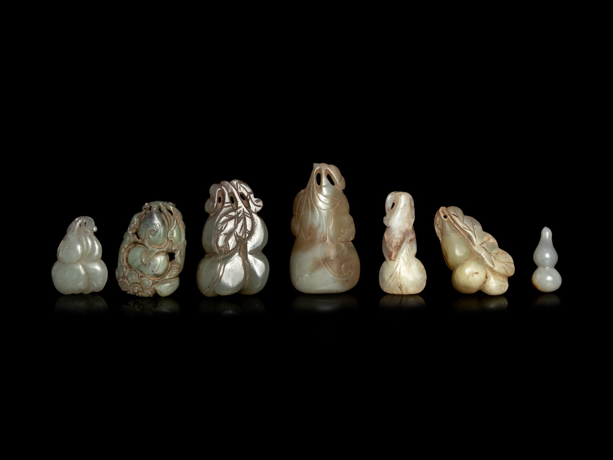 Seven Chinese Celadon Jade Carvings of Double Gourds