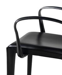 A Set of Eight Contemporary Leather Upholstered Dining Chairs