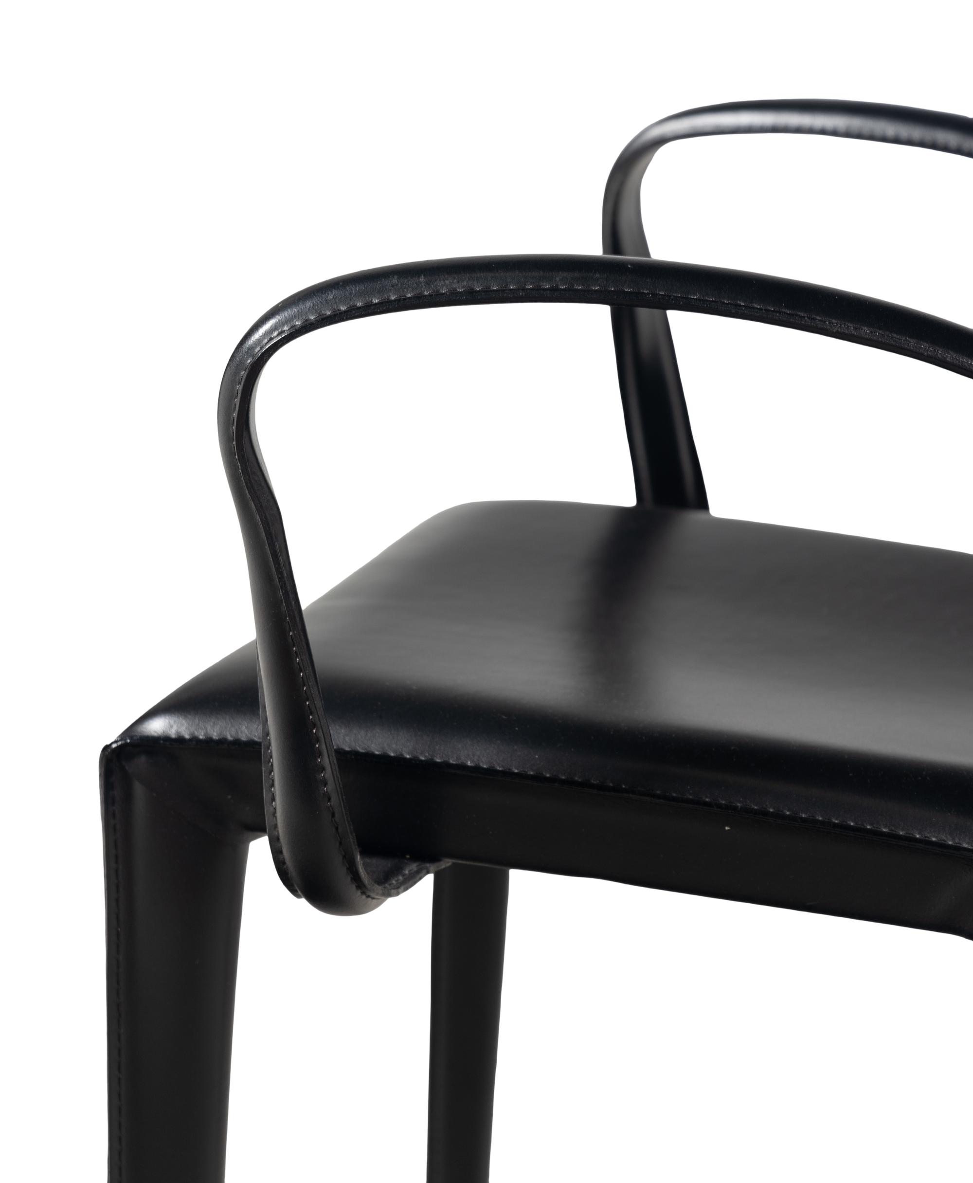 A Set of Eight Contemporary Leather Upholstered Dining Chairs