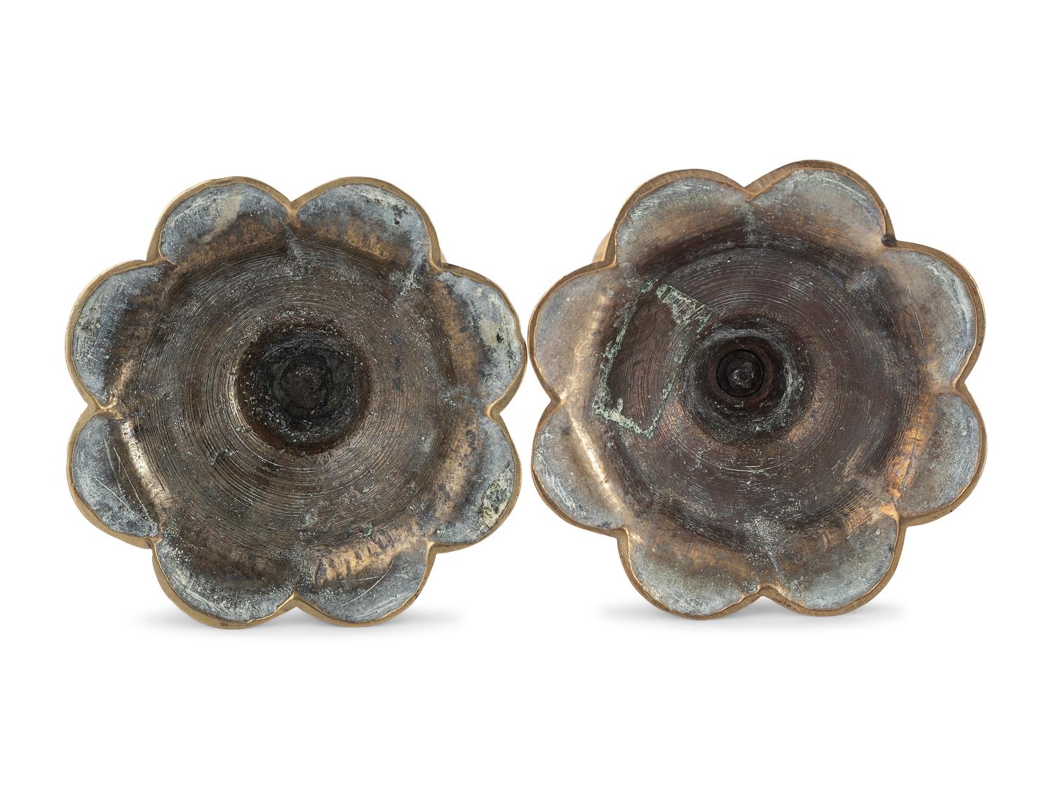 A Pair of English Brass Petal Base Candlesticks