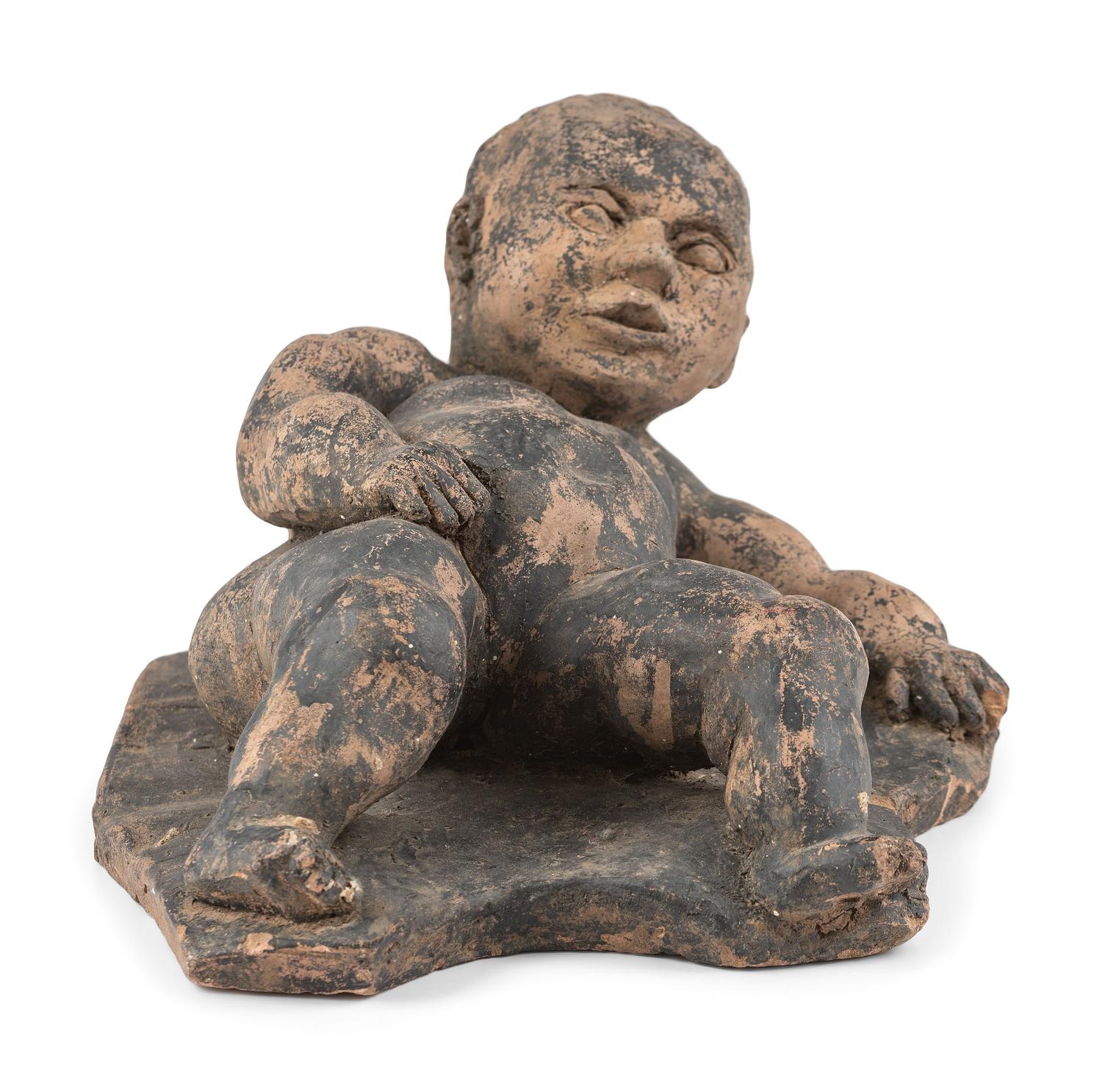 A Clay Roof Tile of a Reclining Baby