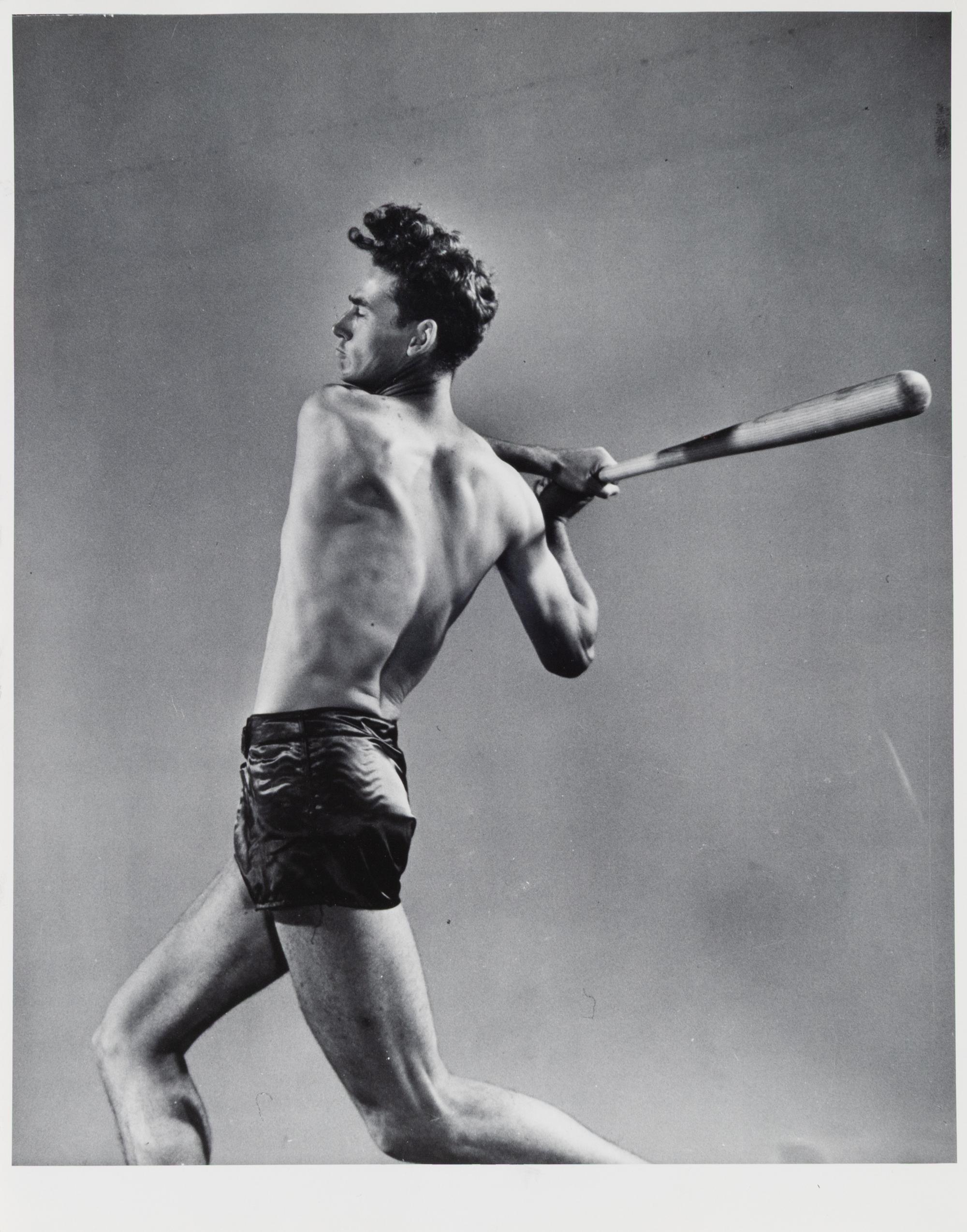 Studio shot of Boston Red Sox star Ted Williams demonstrating his batting technique , 1941; printed ca. 1941