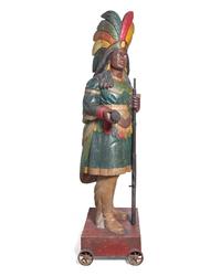 A Carved and Polychrome Painted Tobacconist Figure