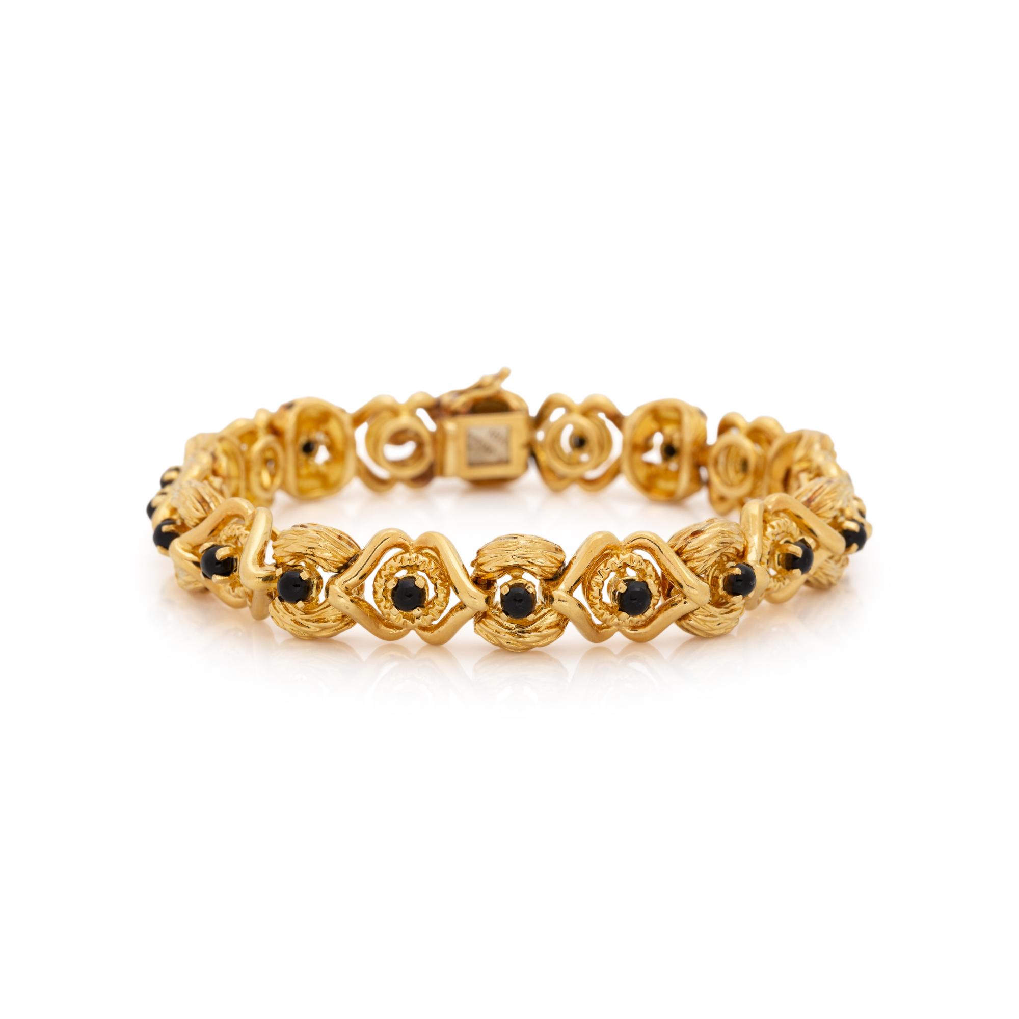 TIFFANY & CO., YELLOW GOLD AND BLACK ONYX BRACELET