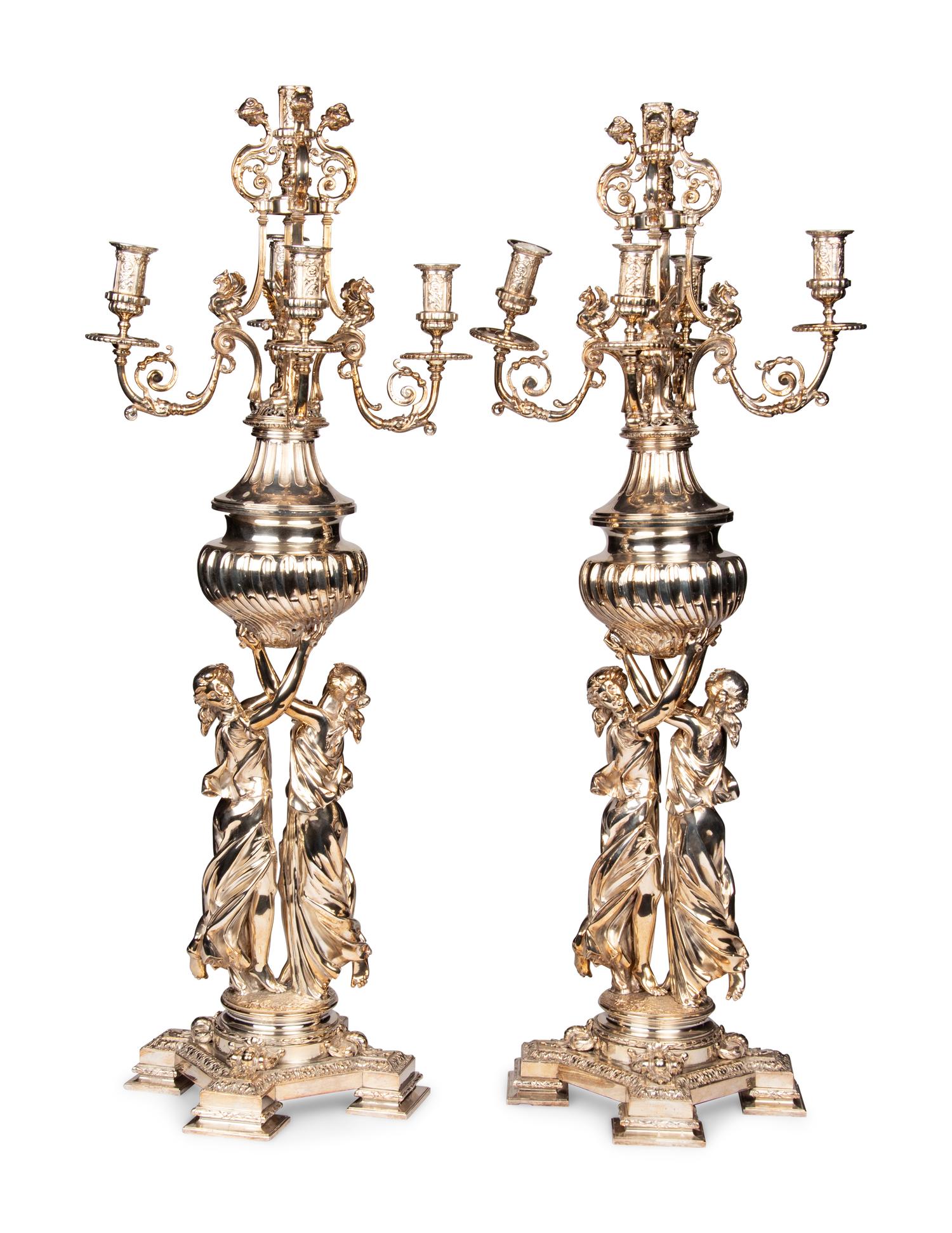 A Pair of Monumental Silver-Plate Figural Six-Light Candelabra