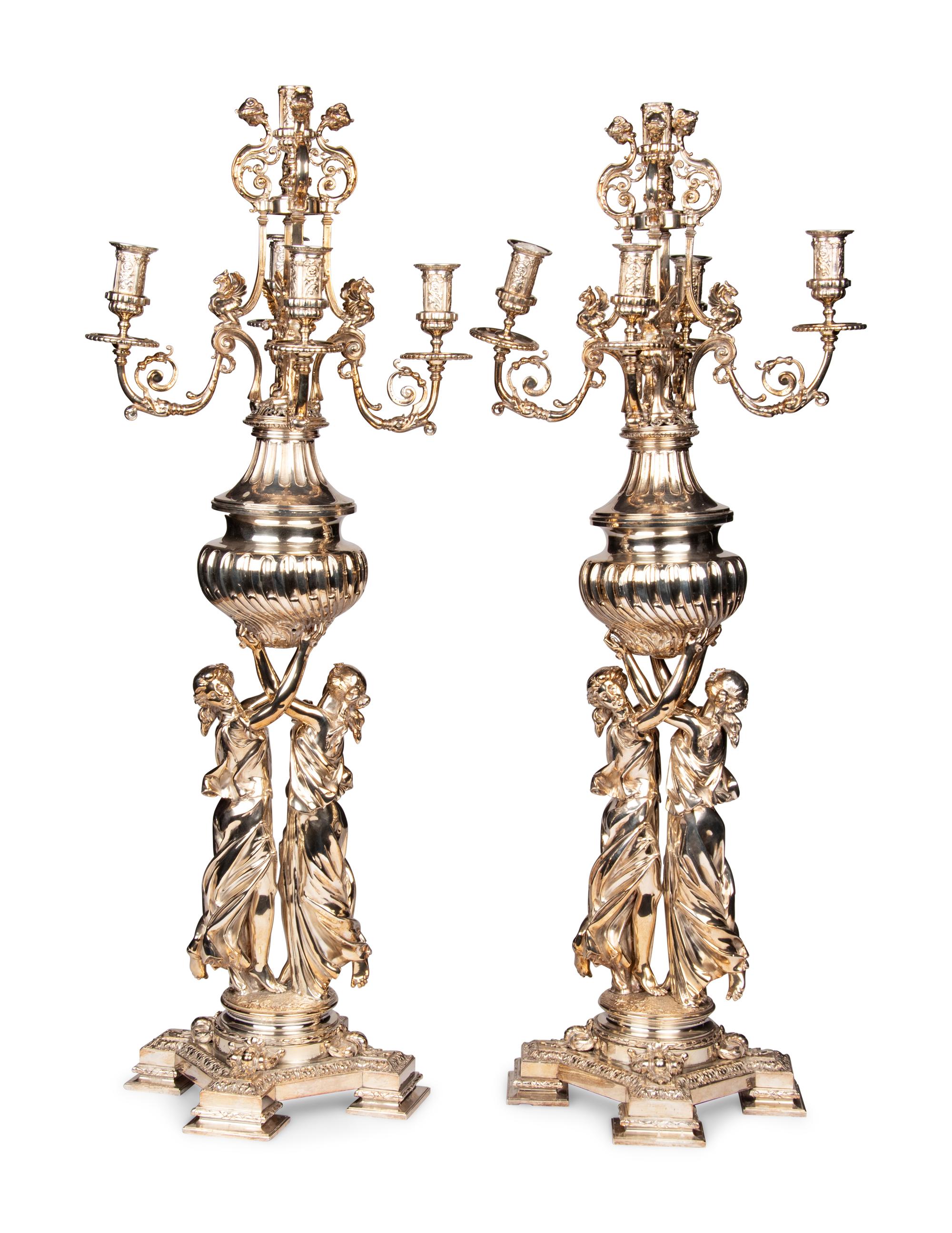 A Pair of Monumental Silver-Plate Figural Six-Light Candelabra