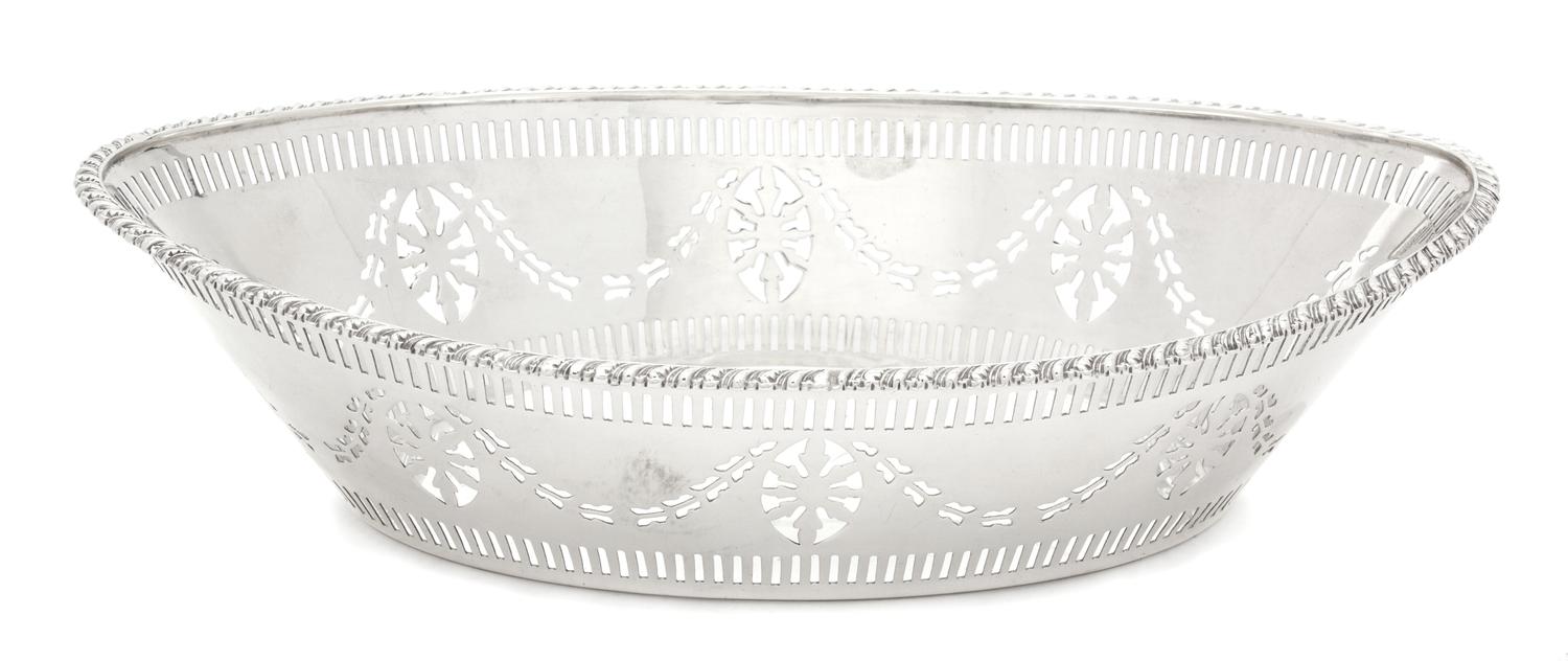 An English Silver Reticulated Oval Bread Basket, Barker Bros. Silversmiths, Ltd., 1913,