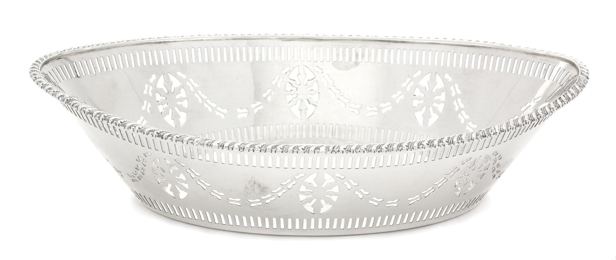 An English Silver Reticulated Oval Bread Basket, Barker Bros. Silversmiths, Ltd., 1913,