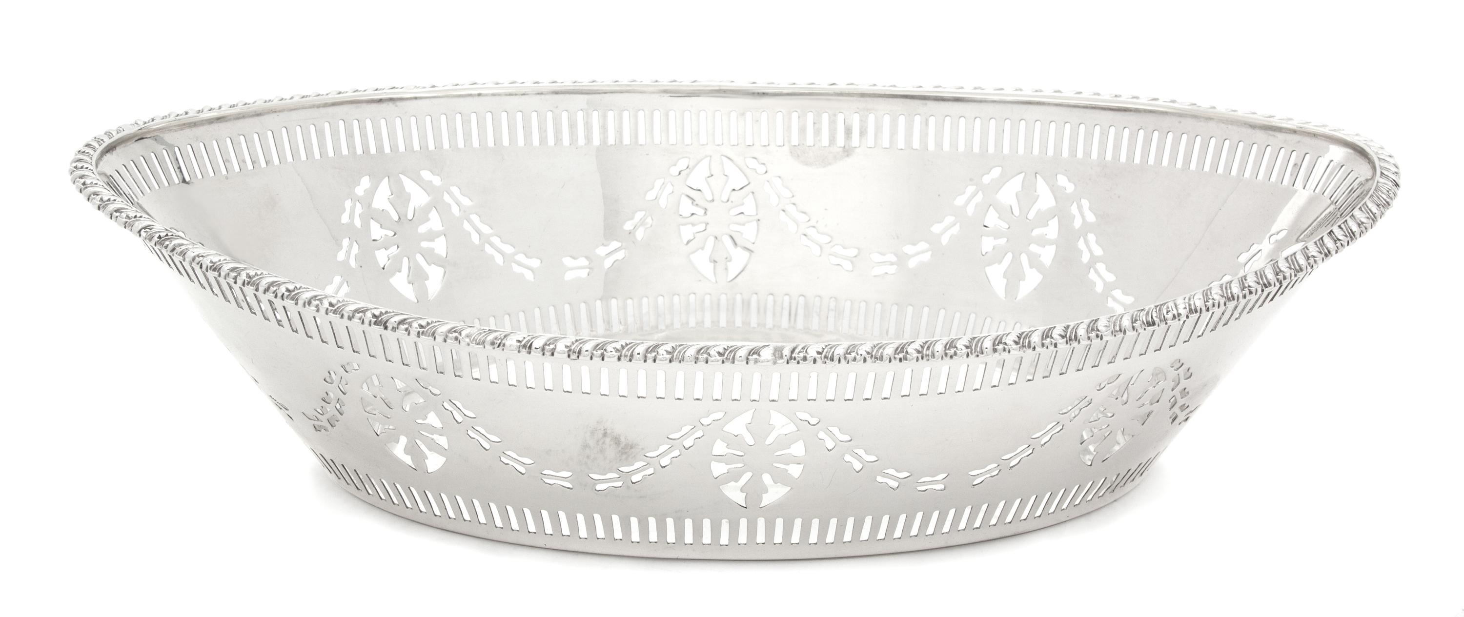 An English Silver Reticulated Oval Bread Basket, Barker Bros. Silversmiths, Ltd., 1913,