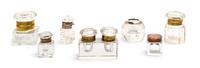 A Group of Seven Glass Inkwells Height of tallest 2 1/4 inches.