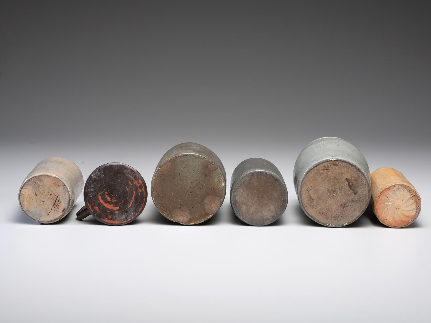 Five Stoneware Bottles and Canning Jars