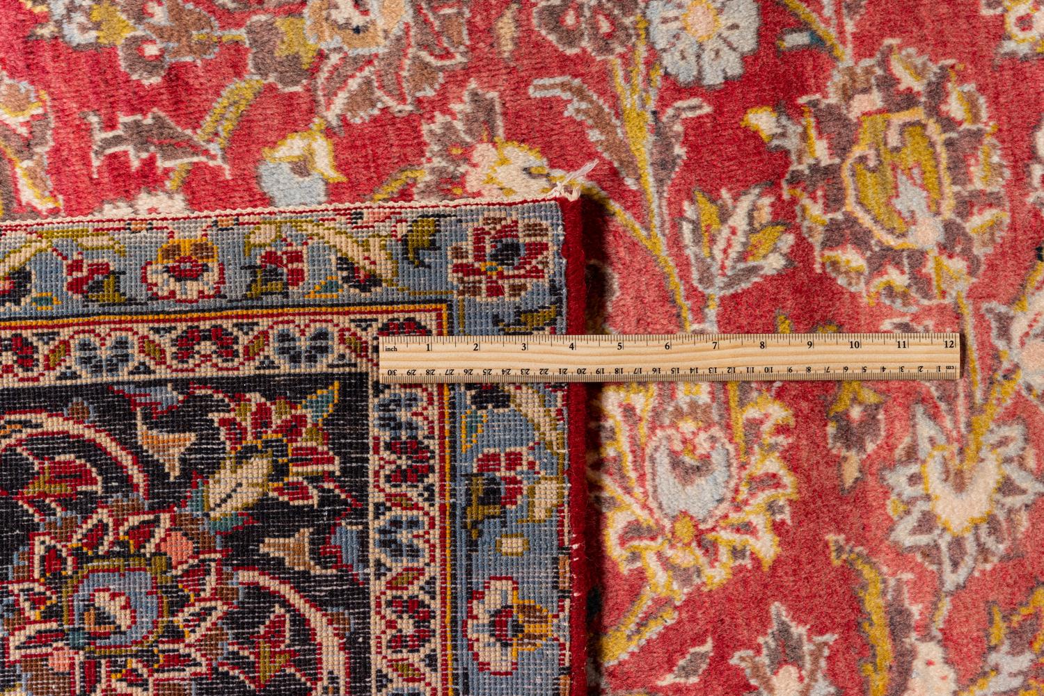 A Kashan Wool Rug