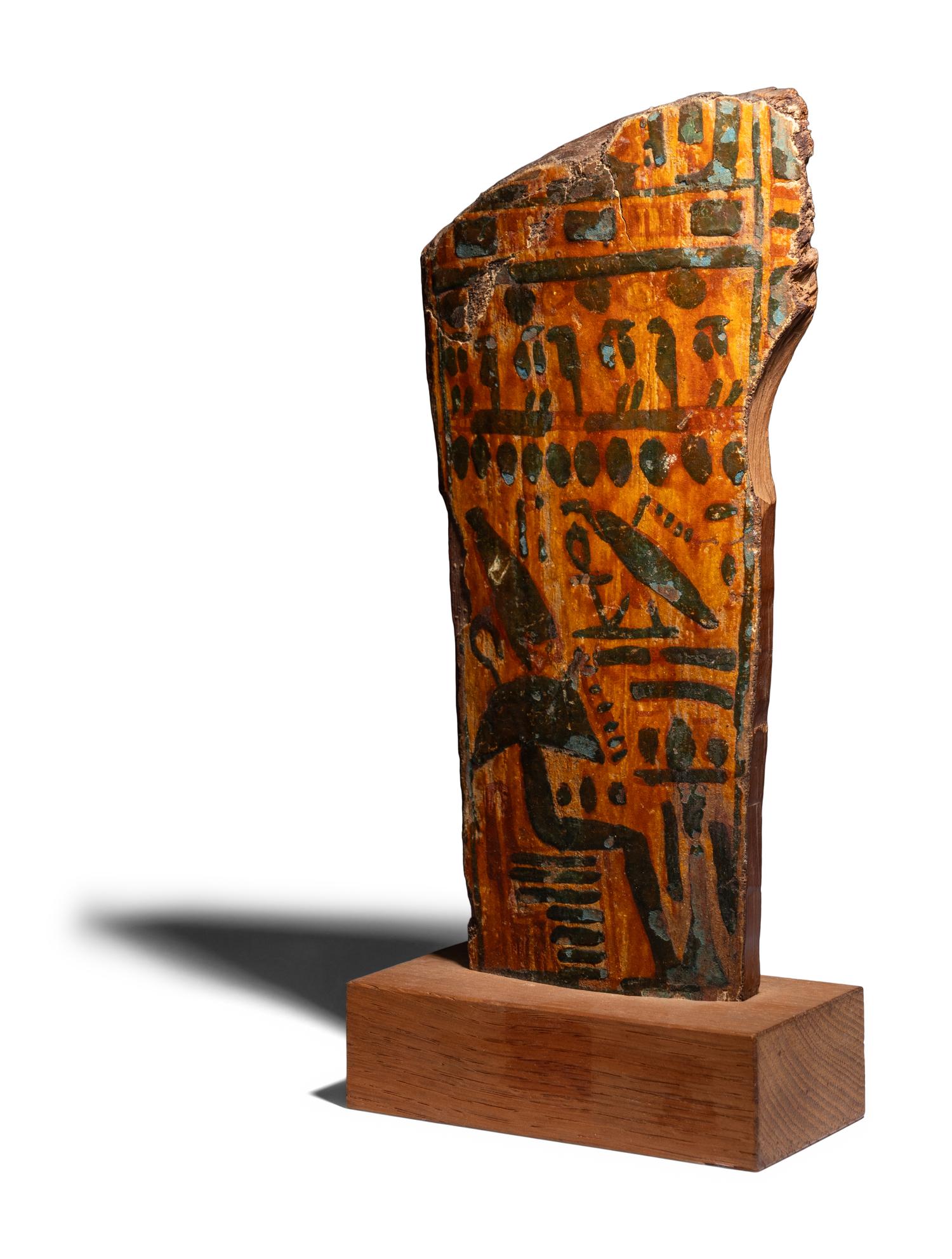 An Egyptian Painted Wood Sarcophagus Fragment