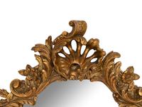 An Italian Rococo Style Giltwood Cartouche-Form Mirror