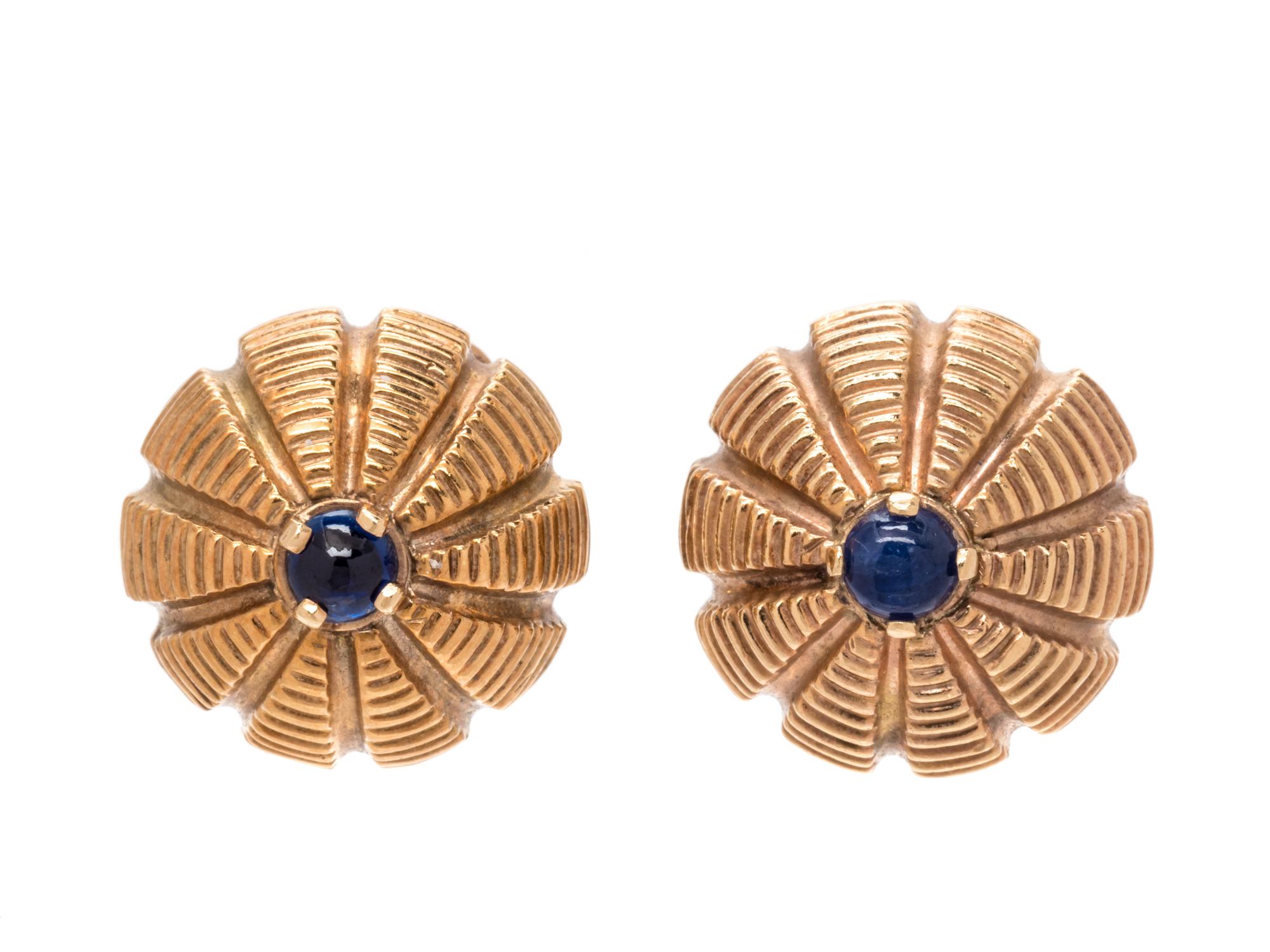A Pair of Yellow Gold and Sapphire Earclips,