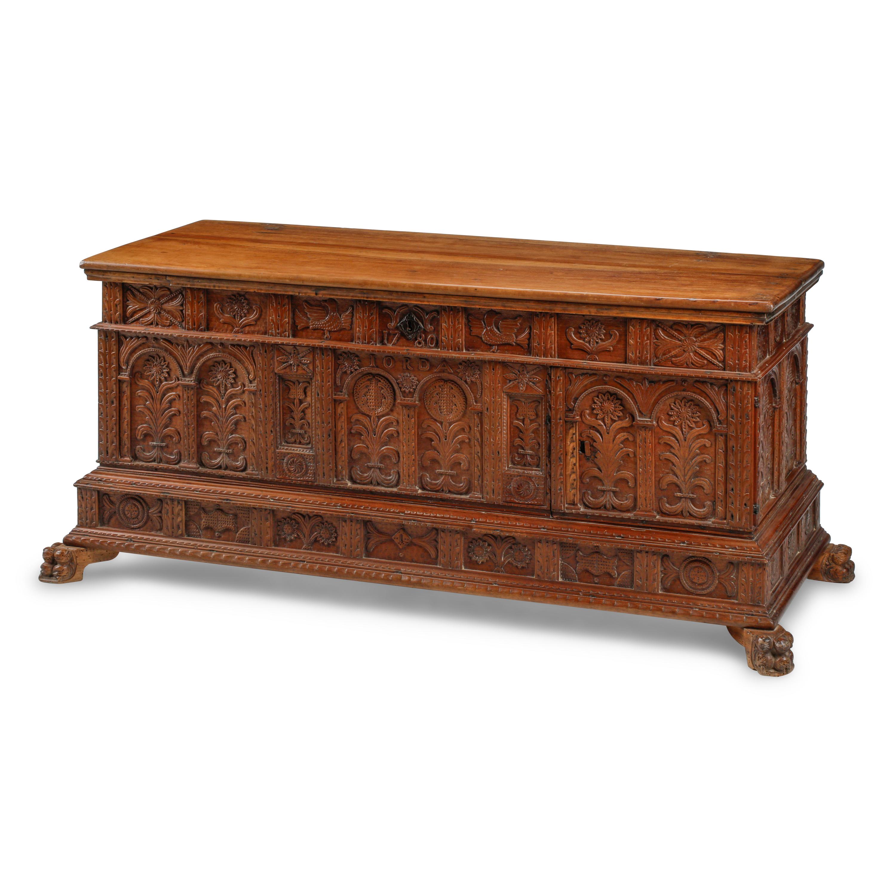 A Continental Carved Walnut Cassone