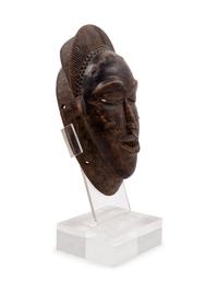 A Baule Style Carved Wood Mask