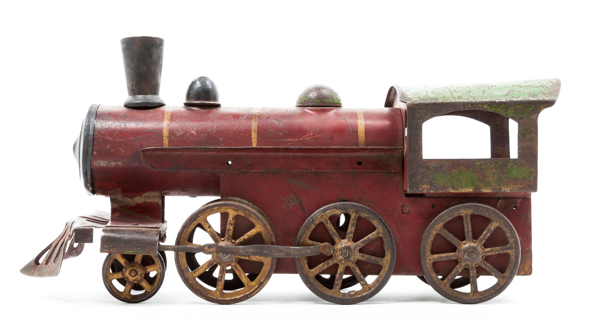 A Tole Model of a Train Engine Length 5 1/2 inches.
