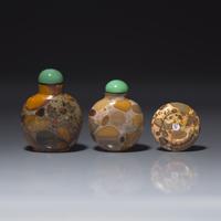 Two Chinese Puddingstone Snuff Bottles, Qing Dynasty, 18th-19th Century, and a Puddingstone Snuff Dish — 清中期 抱子石鼻煙壺兩支及煙碟