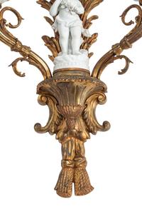 A Pair of Continental Gilt Bronze and Bisque Porcelain Two-Light Sconces