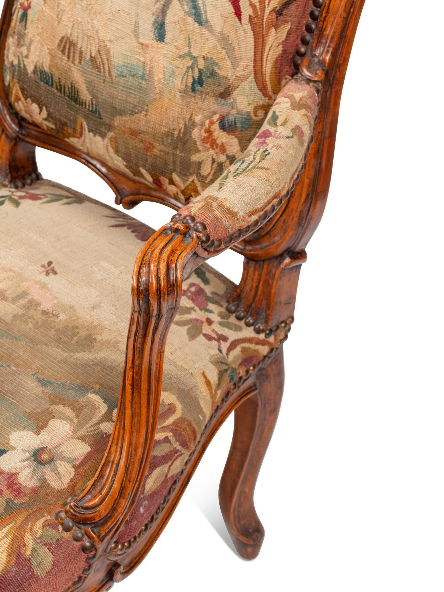 A Set of Four Louis XV Beechwood Fauteuils