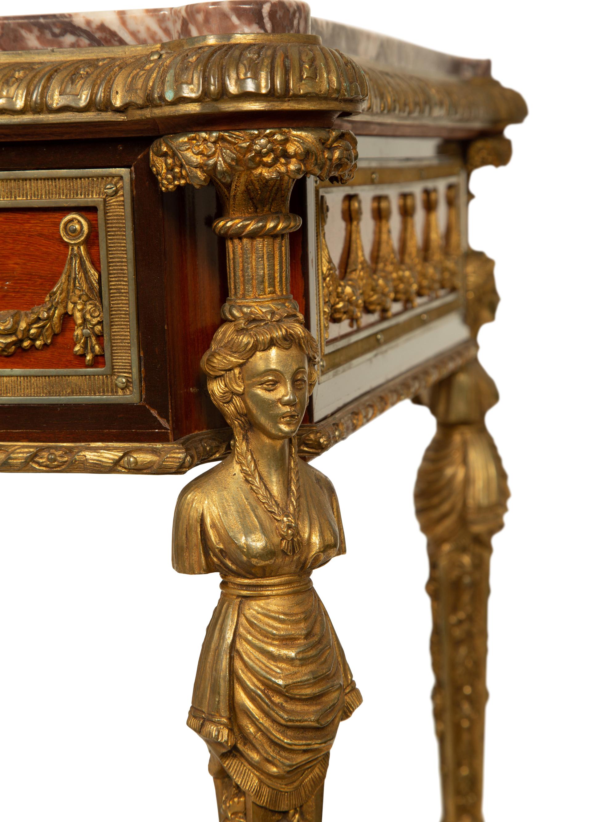 A French Empire Style Gilt Bronze Mounted Mahogany Table with Rouge Marble Top — 19TH CENTURY