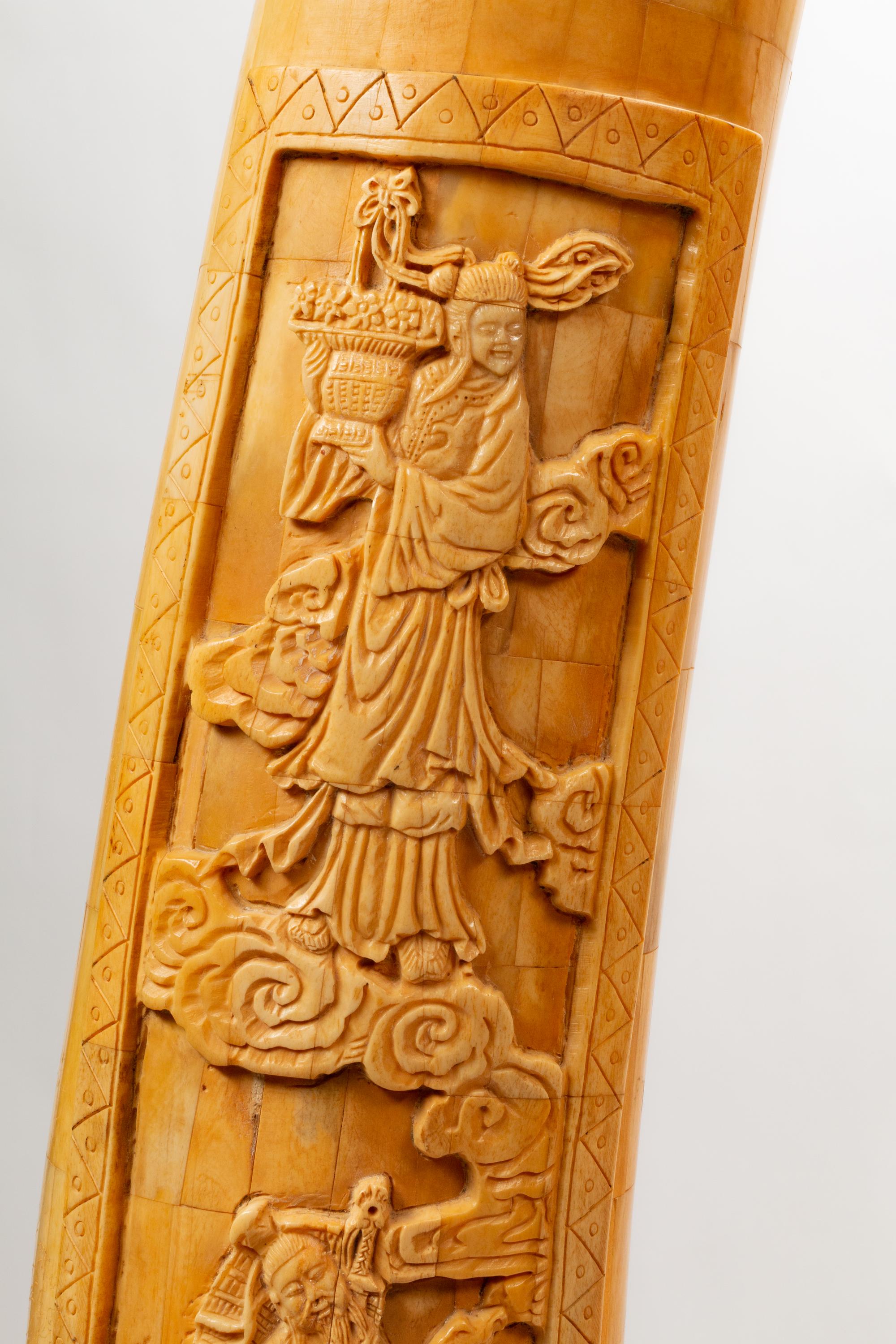 A Pair of Chinese Export Carved Bone Tusks with Wood Bases