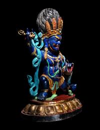 A Large Tibetan Polychrome Painted Wood Figure of a Mahākāla