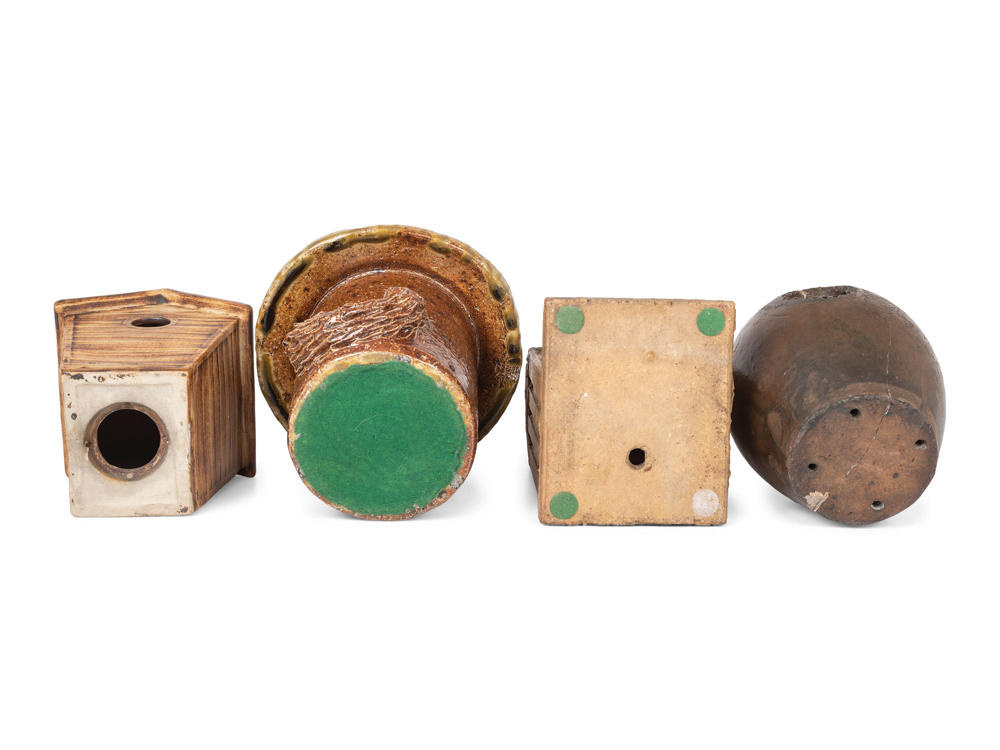 Four Stoneware Birdhouses