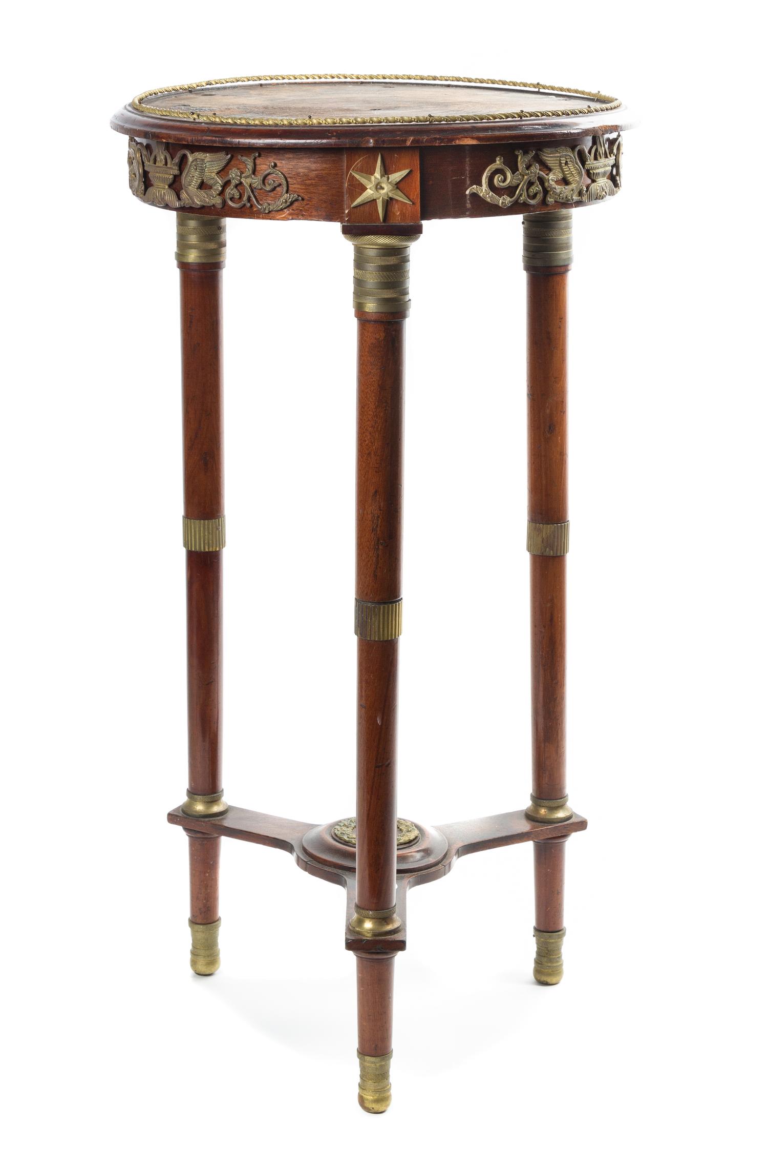 An Empire Style Gilt Bronze Mounted Mahogany Gueridon Height 29 inches. — EARLY 20th CENTURY