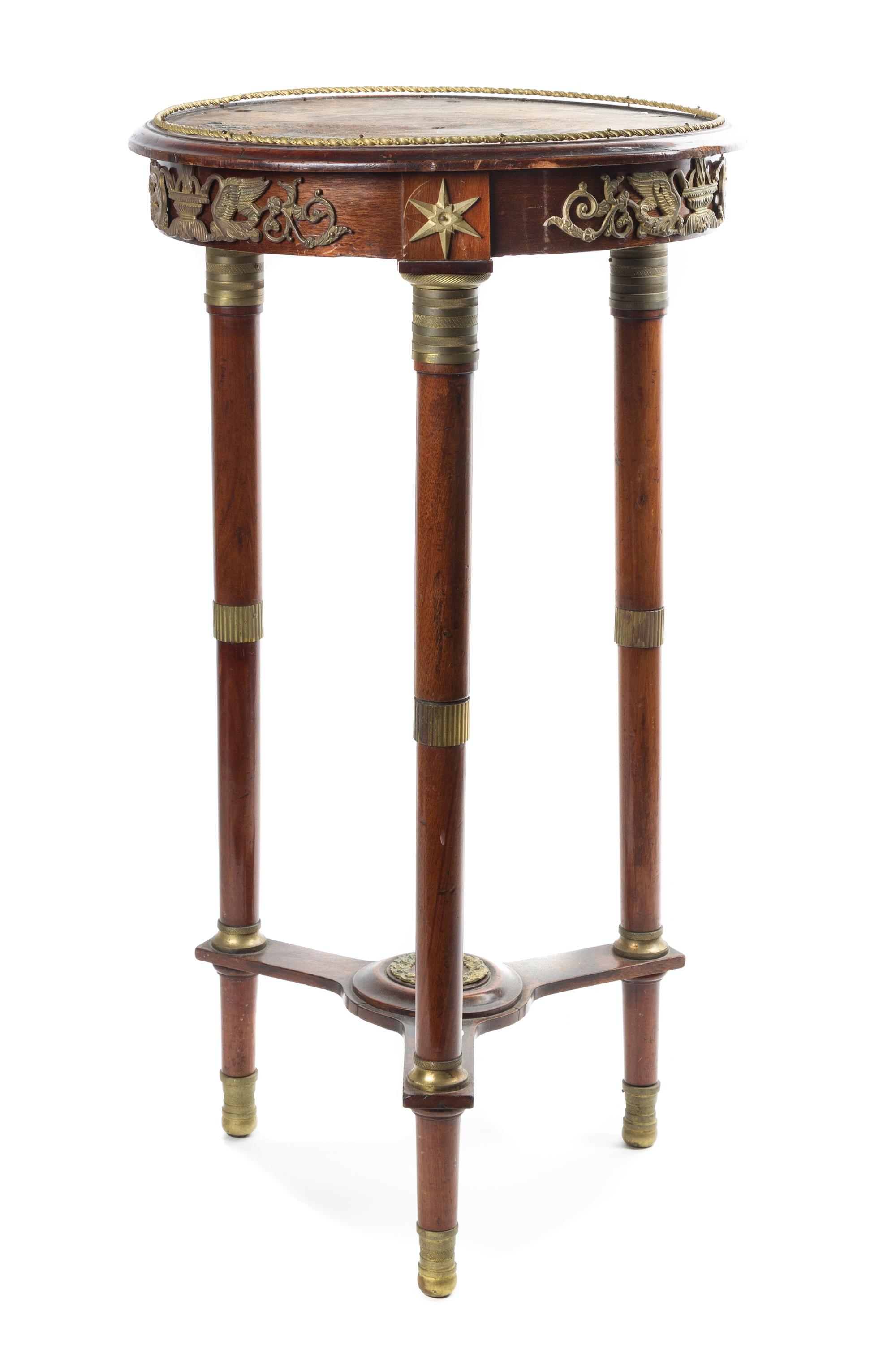 An Empire Style Gilt Bronze Mounted Mahogany Gueridon Height 29 inches. — EARLY 20th CENTURY