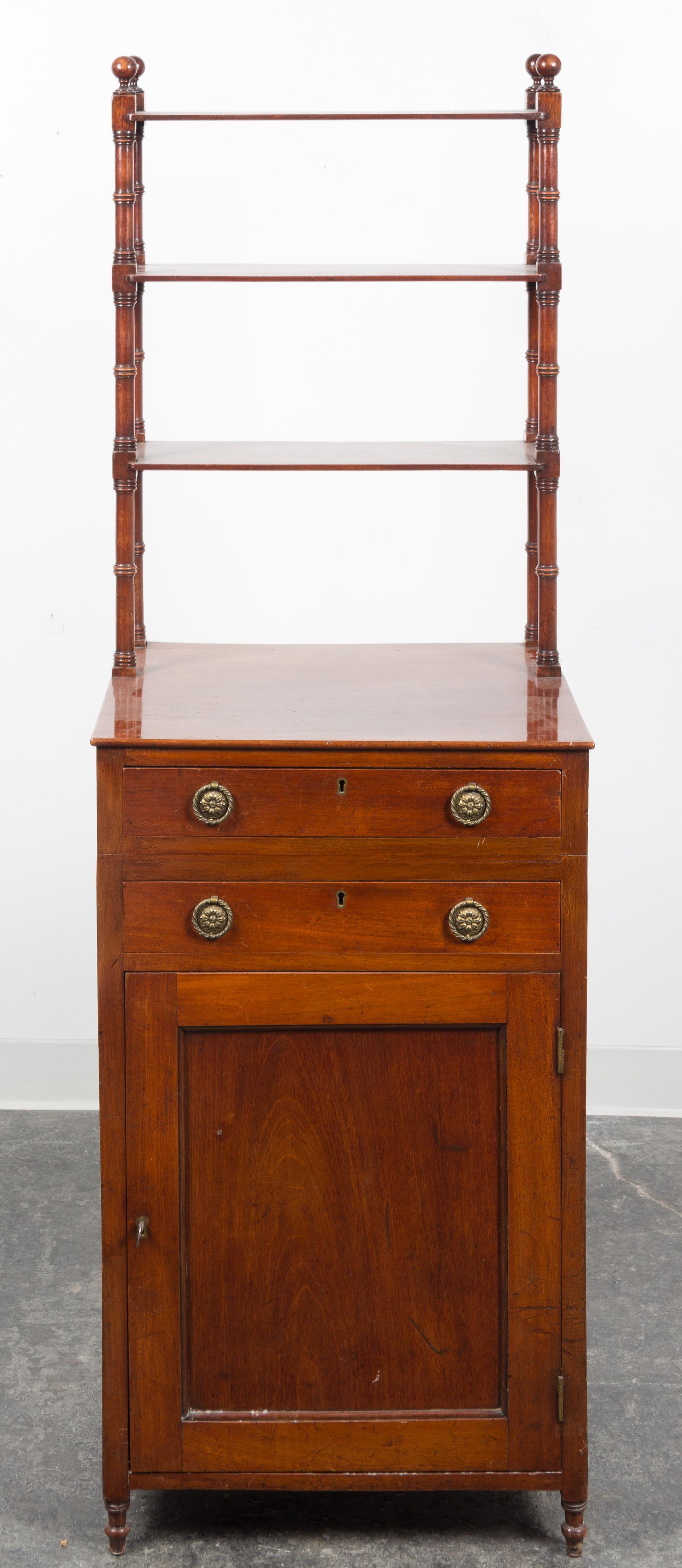 A Regency Style Cupboard Height 61 1/4 x width 20 x depth 18 inches.