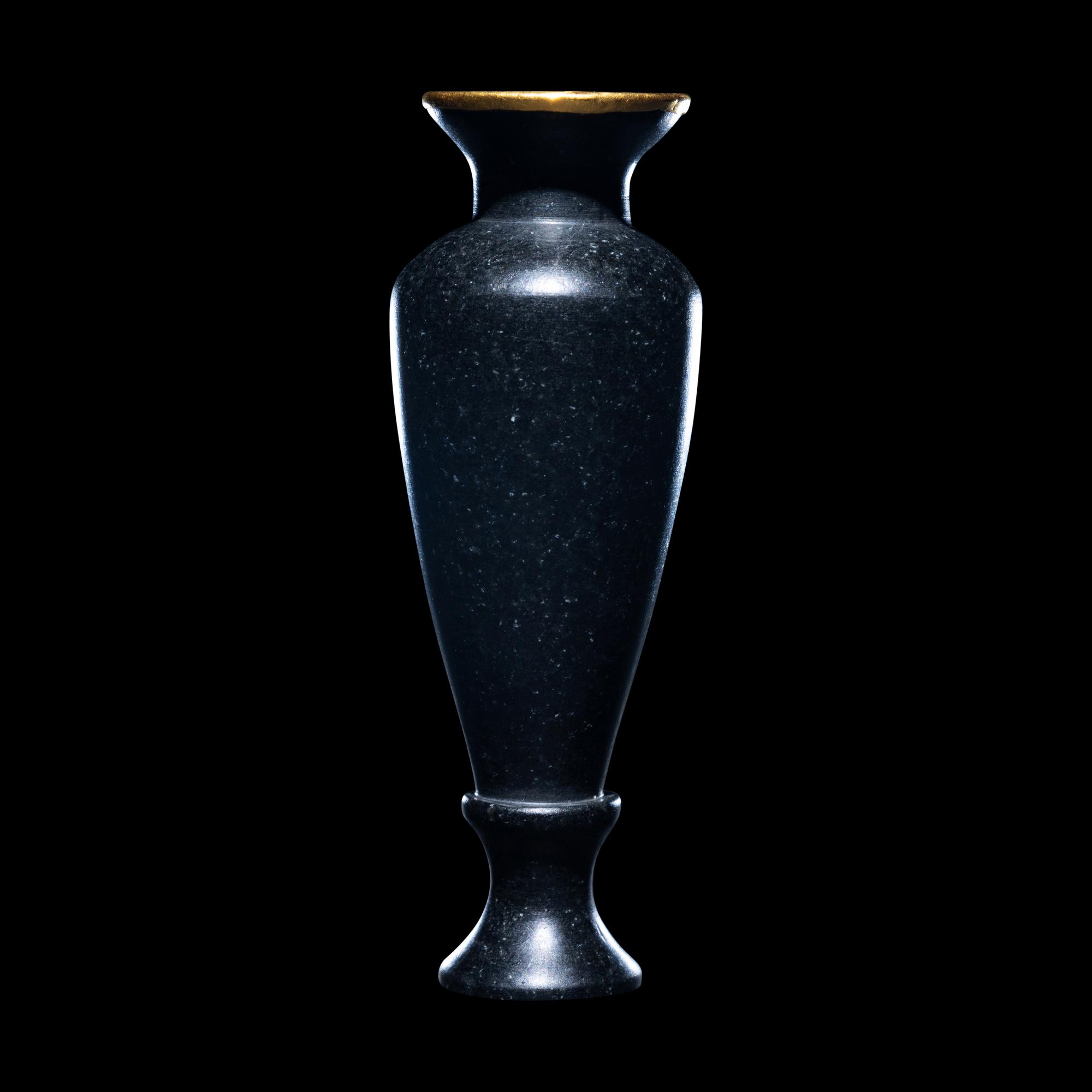An Egyptian Obsidian and Gold Alabastron