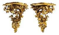 A Pair of Large Italian Giltwood Wall Brackets Height 19 1/2 inches. — 19TH CENTURY
