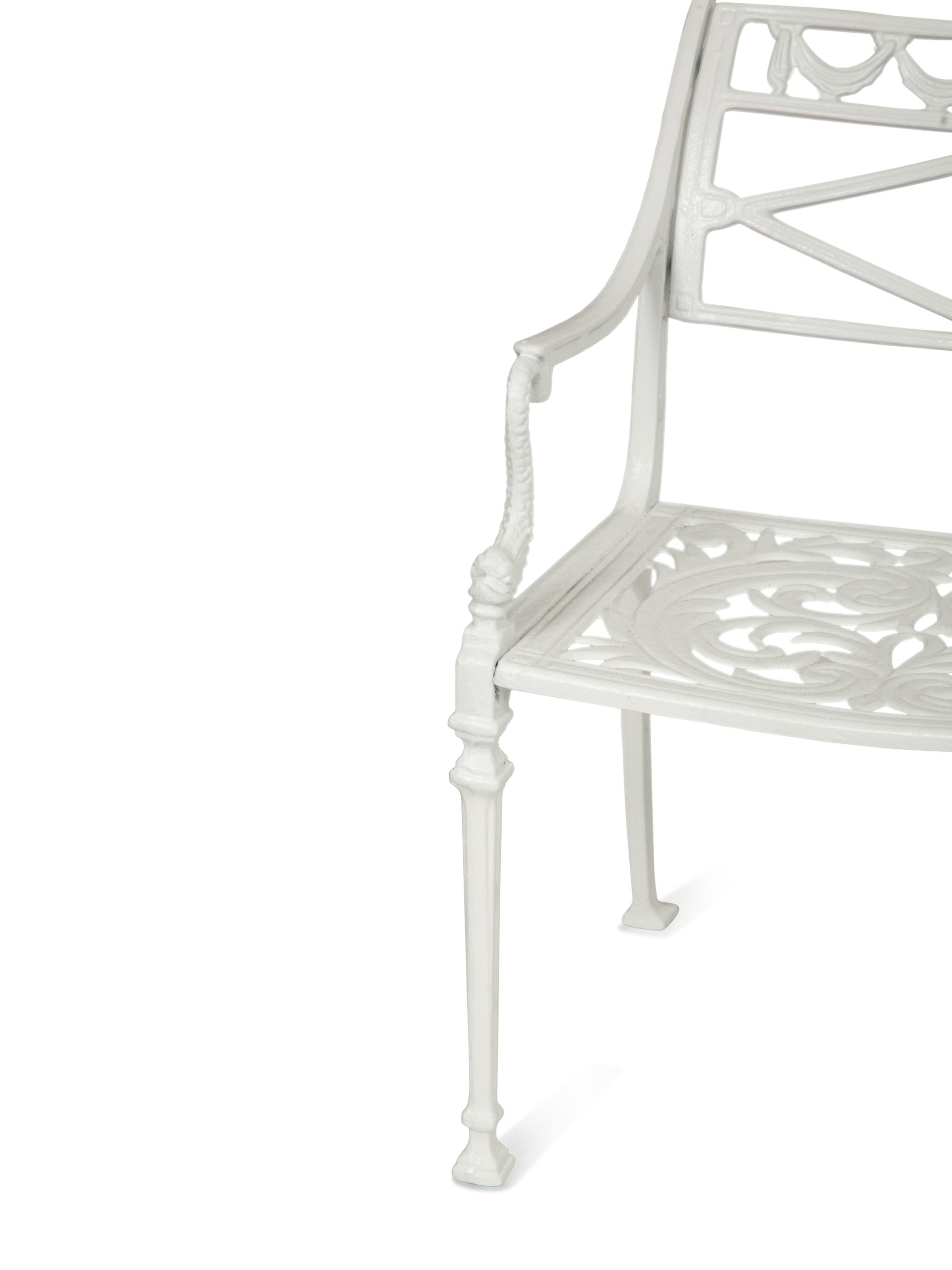 A Suite of White-Painted Cast Metal Garden Furniture