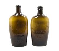 Two American Amber Glass Flasks, Height of taller 8 inches.