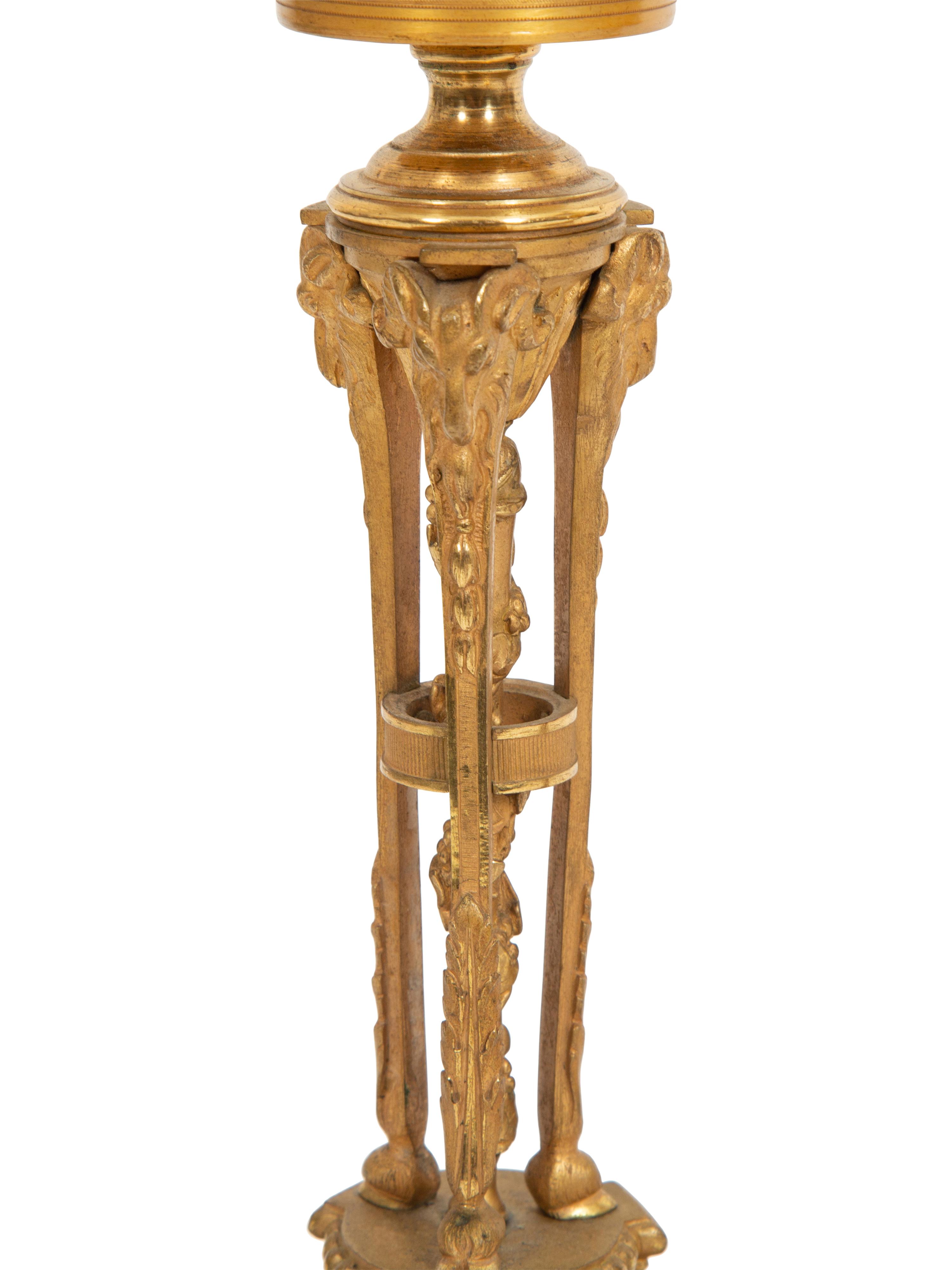 A Pair of French Gilt Bronze Tripartite Candlesticks