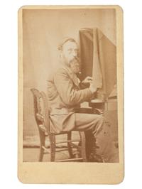 [EARLY PHOTOGRAPHY]. Occupational CDV of a gentleman with a photo retouching tent or shroud. Chicago, IL: Loveday's Gallery of Art, n.d.