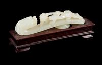 A Carved White Jade Belt Hook Length 3 3/4 inches. — 18TH/19TH CENTURY