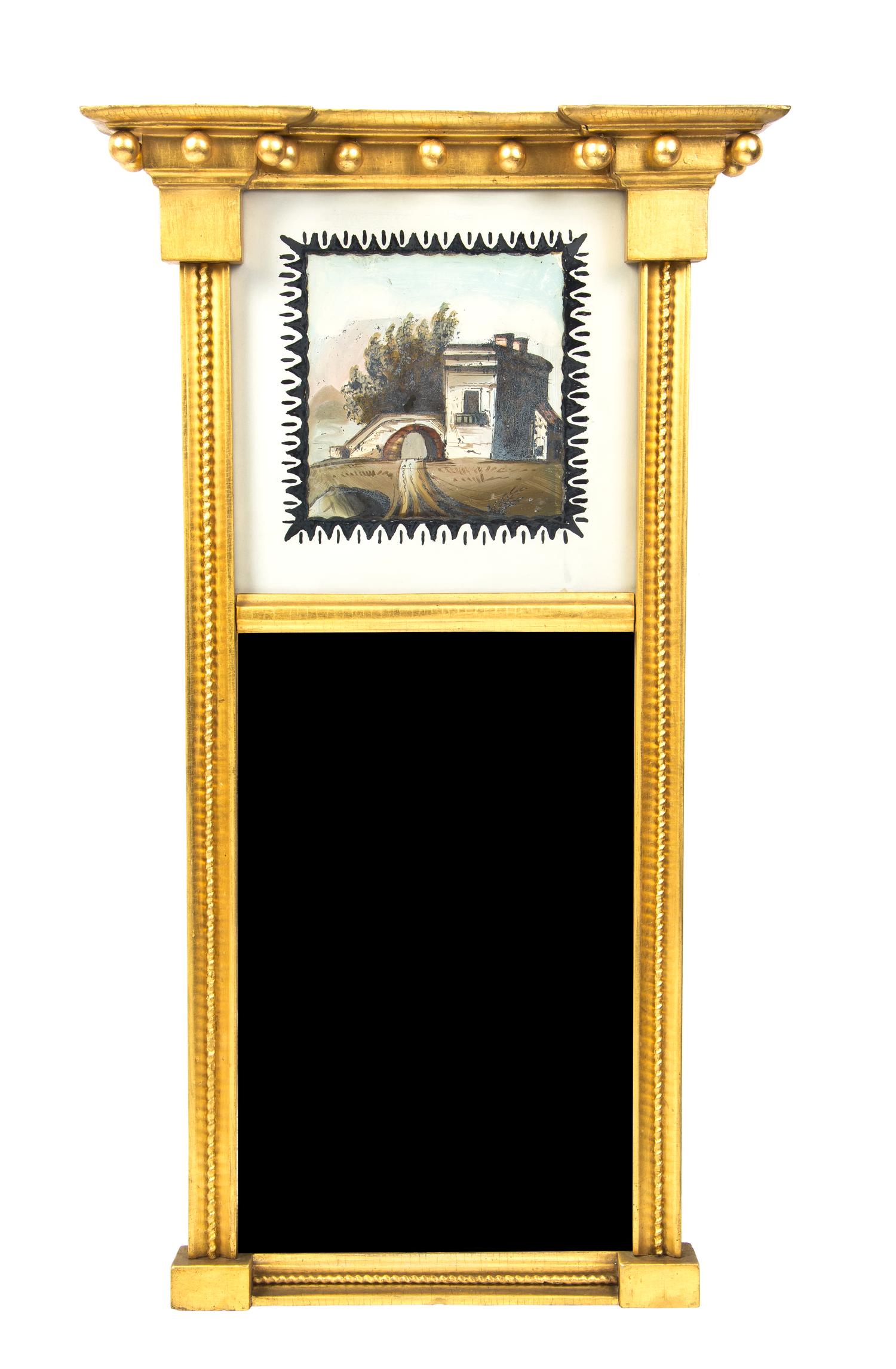An American Giltwood and Reverse Painted Glass Tablet Mirror, Height overall 25 5/8 inches.