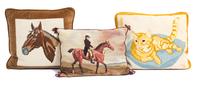 Three Needlepoint Pillows Largest length 17 inches. — 20TH CENTURY