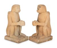 A Pair of Cast Stone Monkey-Form Torchere Holders