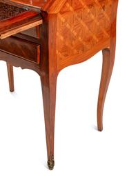 A Louis XV Style Gilt Bronze Mounted Tulipwood Parquetry Bureau en Pente