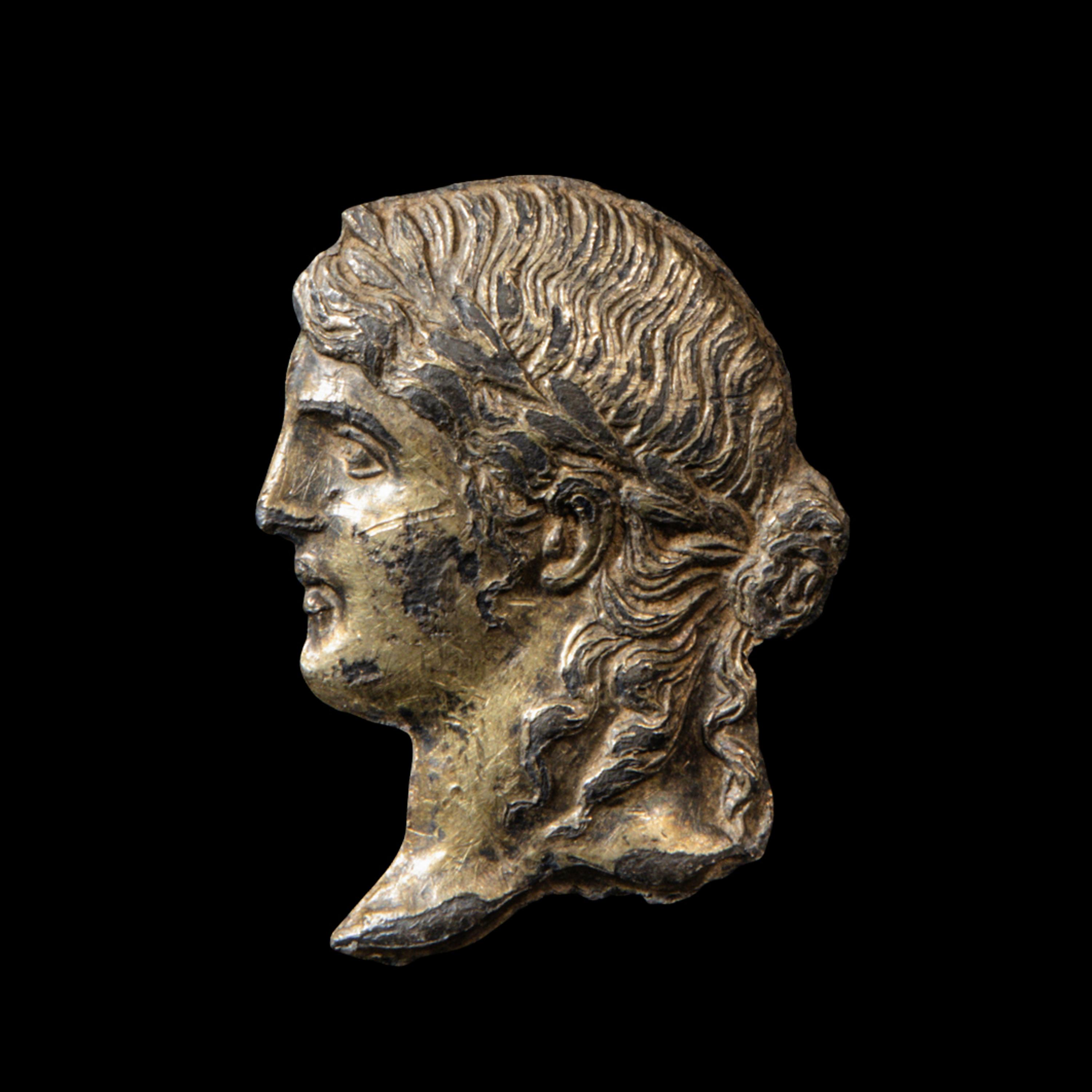A Greek Gilt-Silver Apollo Appliqué