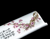 A Famille Rose Porcelain Scroll-Form Wrist Rest