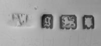 A George V Silver Mounted Cut Glass Bowl, Mappin & Webb, London, 1922, the silver rim above the bowl with geometric decoration.
