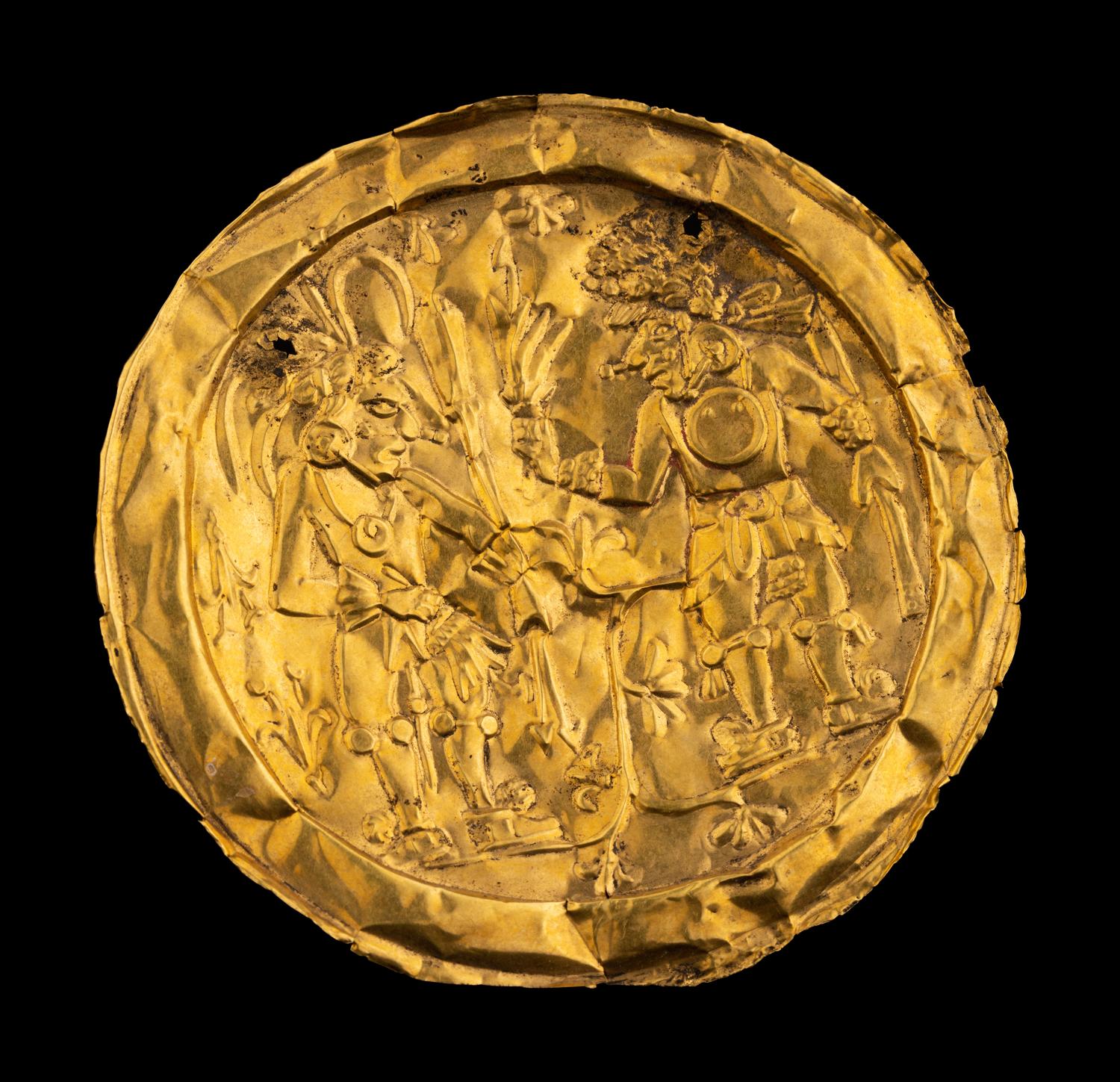 An Aztec or Toltec Gold Embossed Disc