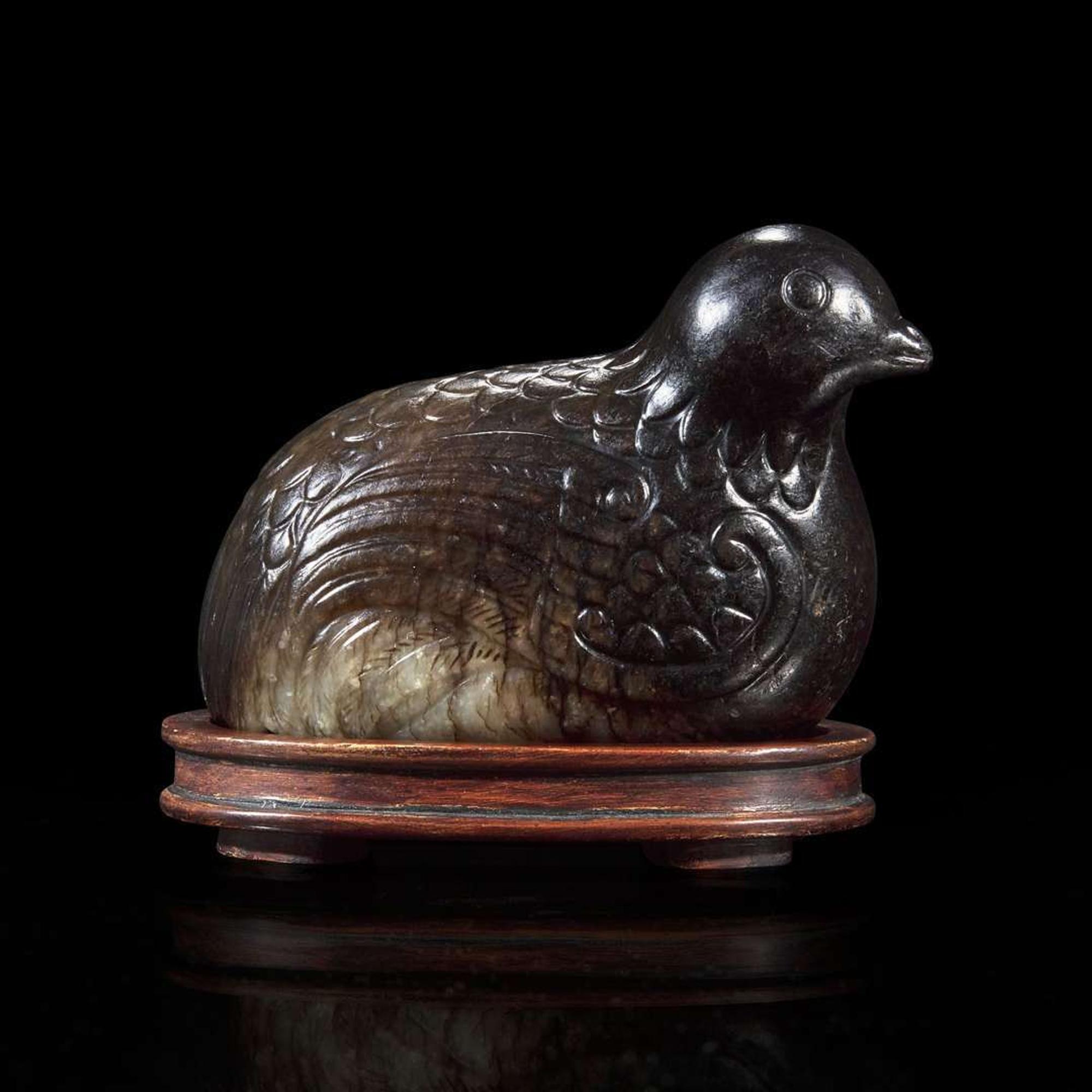 A Chinese dark blackish-brown and grey jade carving of a quail 玉雕鹧鸪 Ming to early Qing dynasty ????