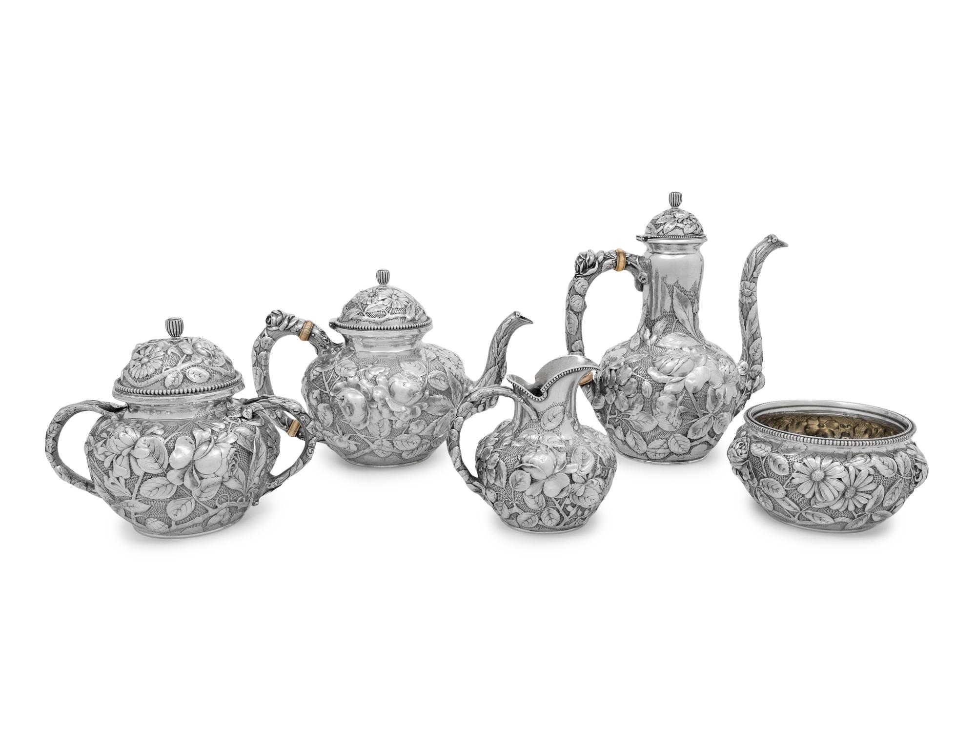 An American Silver Repoussé Five-Piece Tea and Coffee Service
